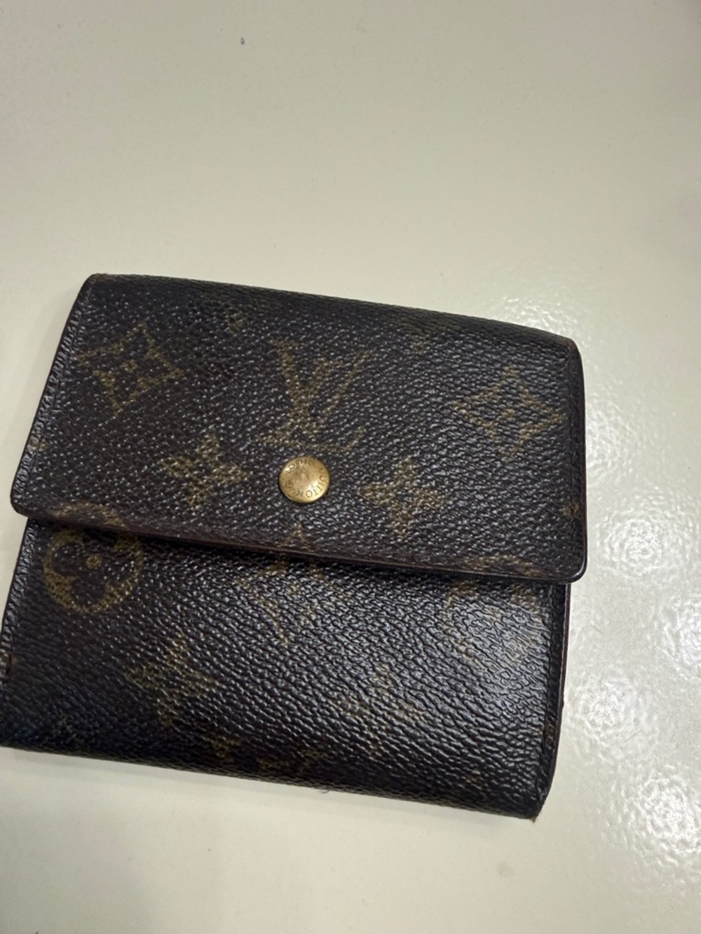 Louis Vuitton Monogram Wallet in Dark Brown with Gold Snap this  year - 1995
